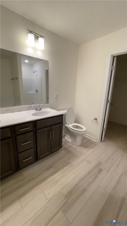 4944 Bailey Woods Lane Midlothian, VA 23112 - Photo 40 of 50 a bathroom with a granite countertop sink toilet and mirror