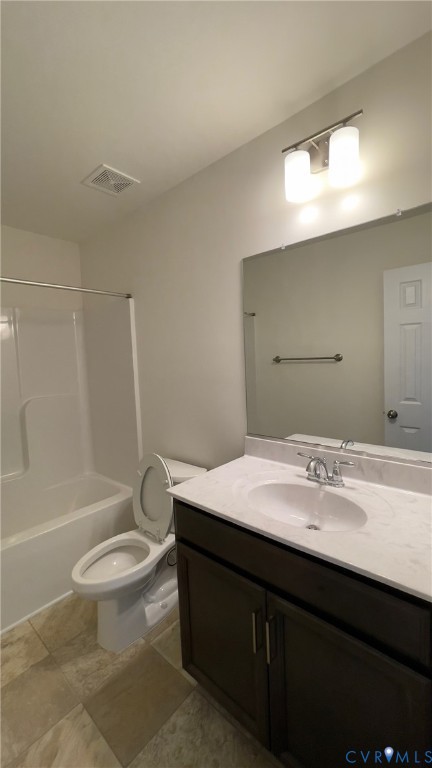 4944 Bailey Woods Lane Midlothian, VA 23112 - Photo 47 of 50 a bathroom with a granite countertop sink a toilet a mirror and bathtub