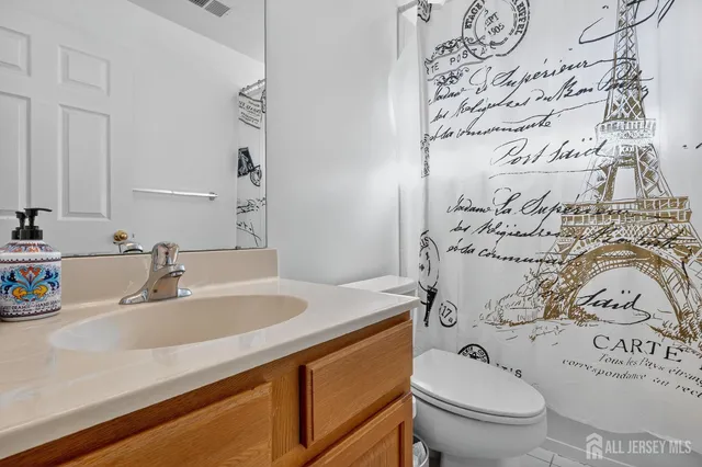 a bedroom with two beds and a window