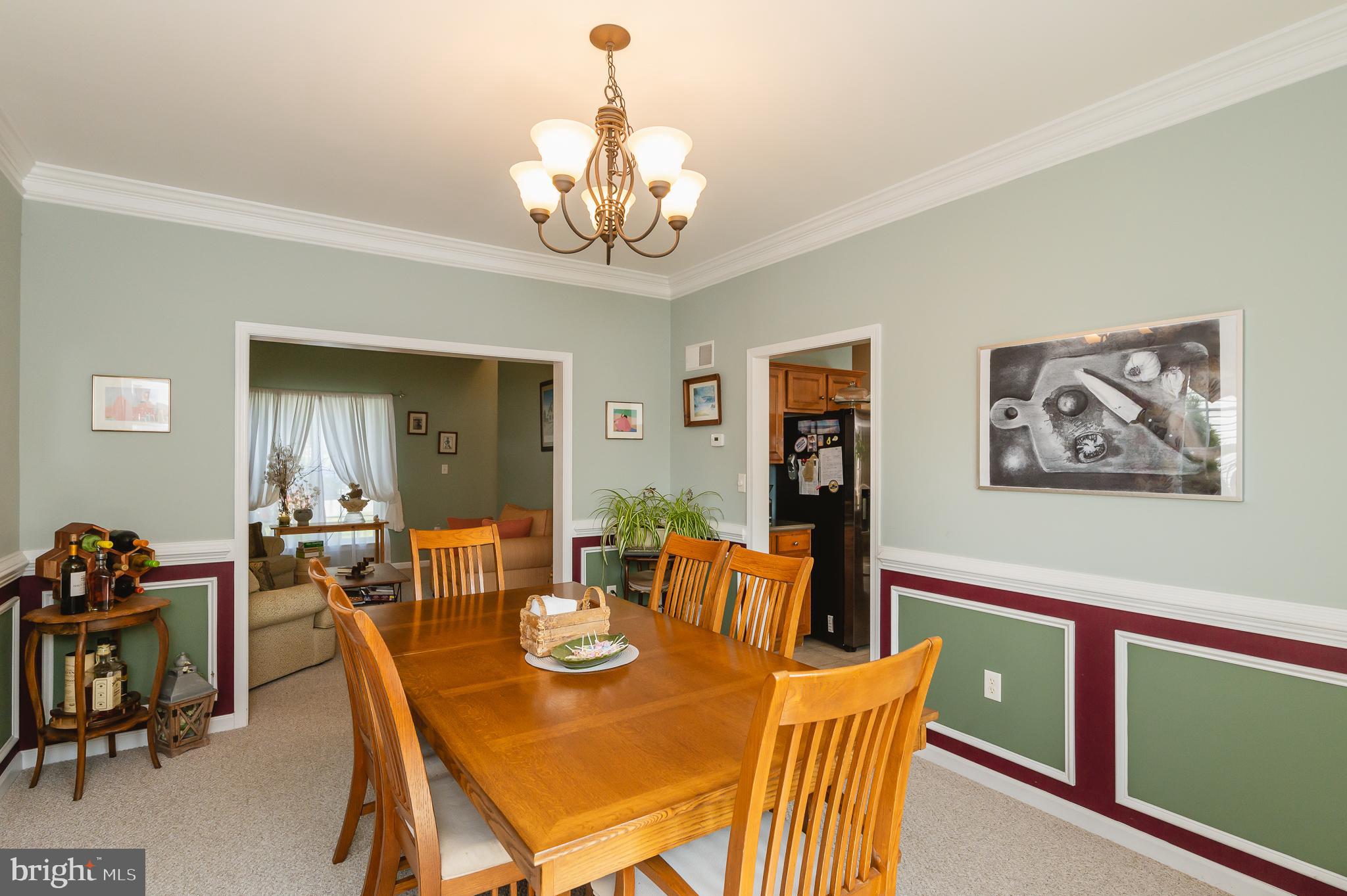 24 Eagleton Drive York, PA 17407 - Photo 13 of 70 a view of a dining room with furniture and chandelier