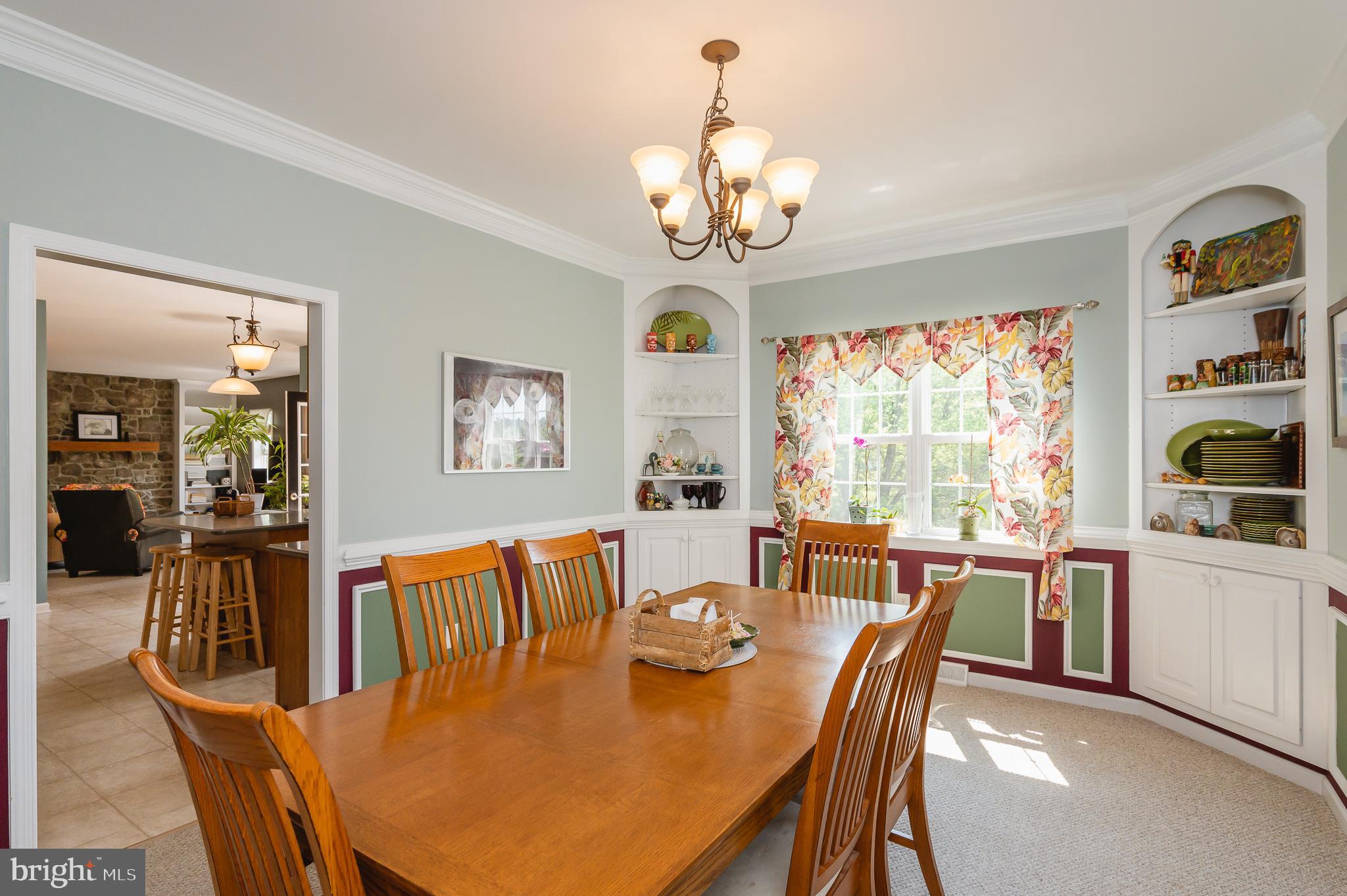 24 Eagleton Drive York, PA 17407 - Photo 16 of 70 a view of a dining room with furniture a chandelier and window