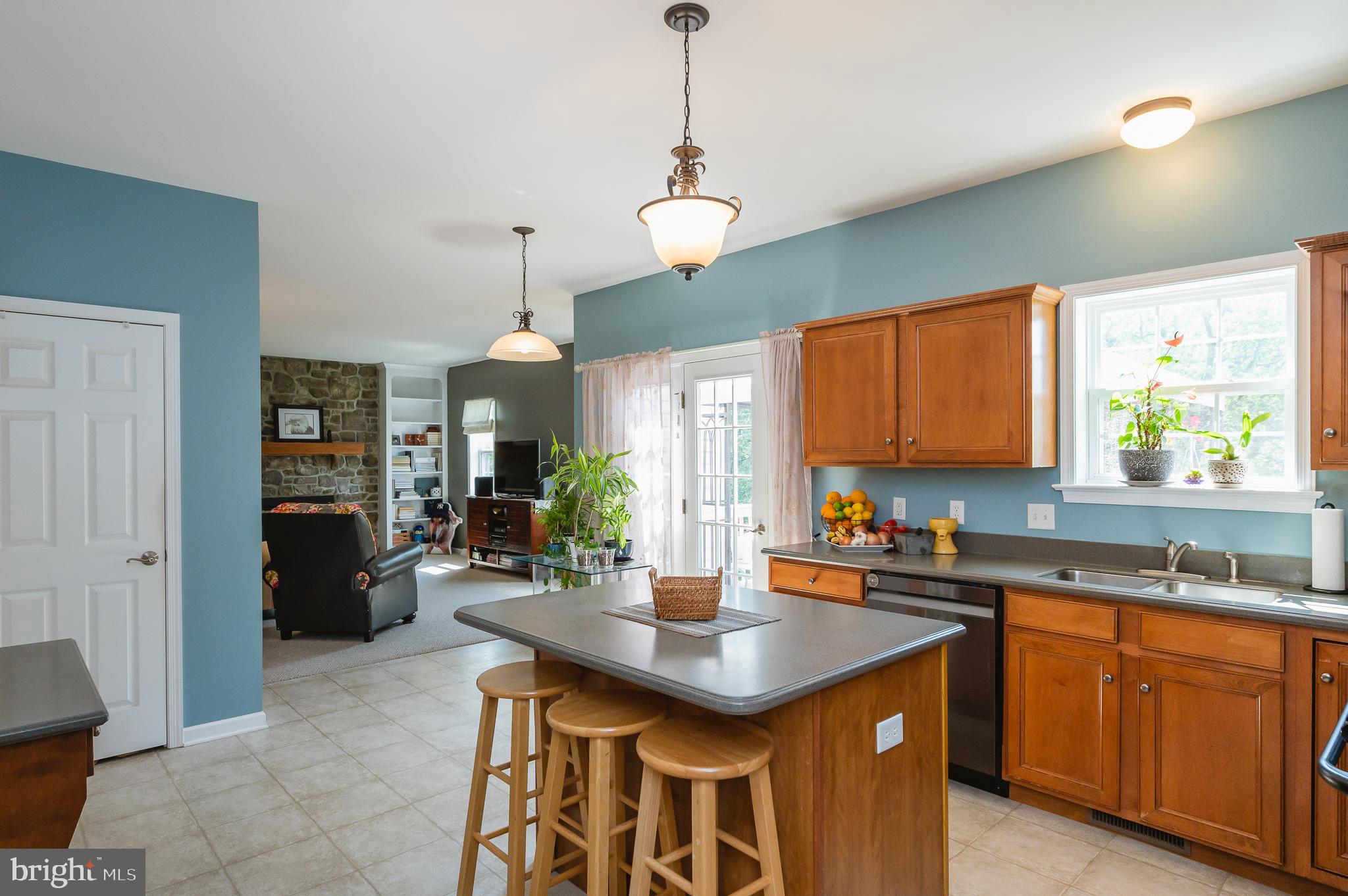 24 Eagleton Drive York, PA 17407 - Photo 17 of 70 a kitchen with a sink a counter top space and living room view