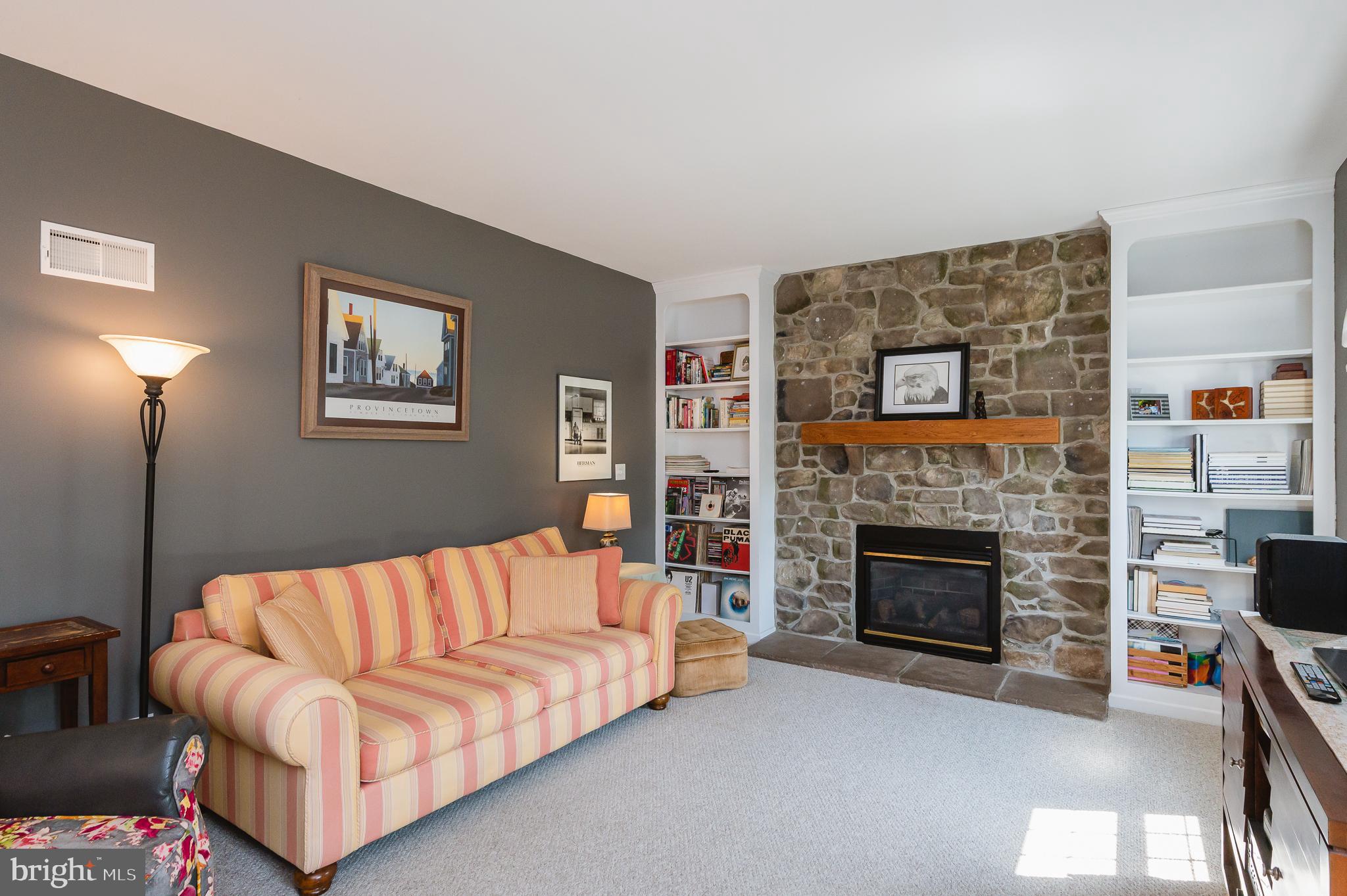 24 Eagleton Drive York, PA 17407 - Photo 24 of 70 a living room with furniture and a fireplace