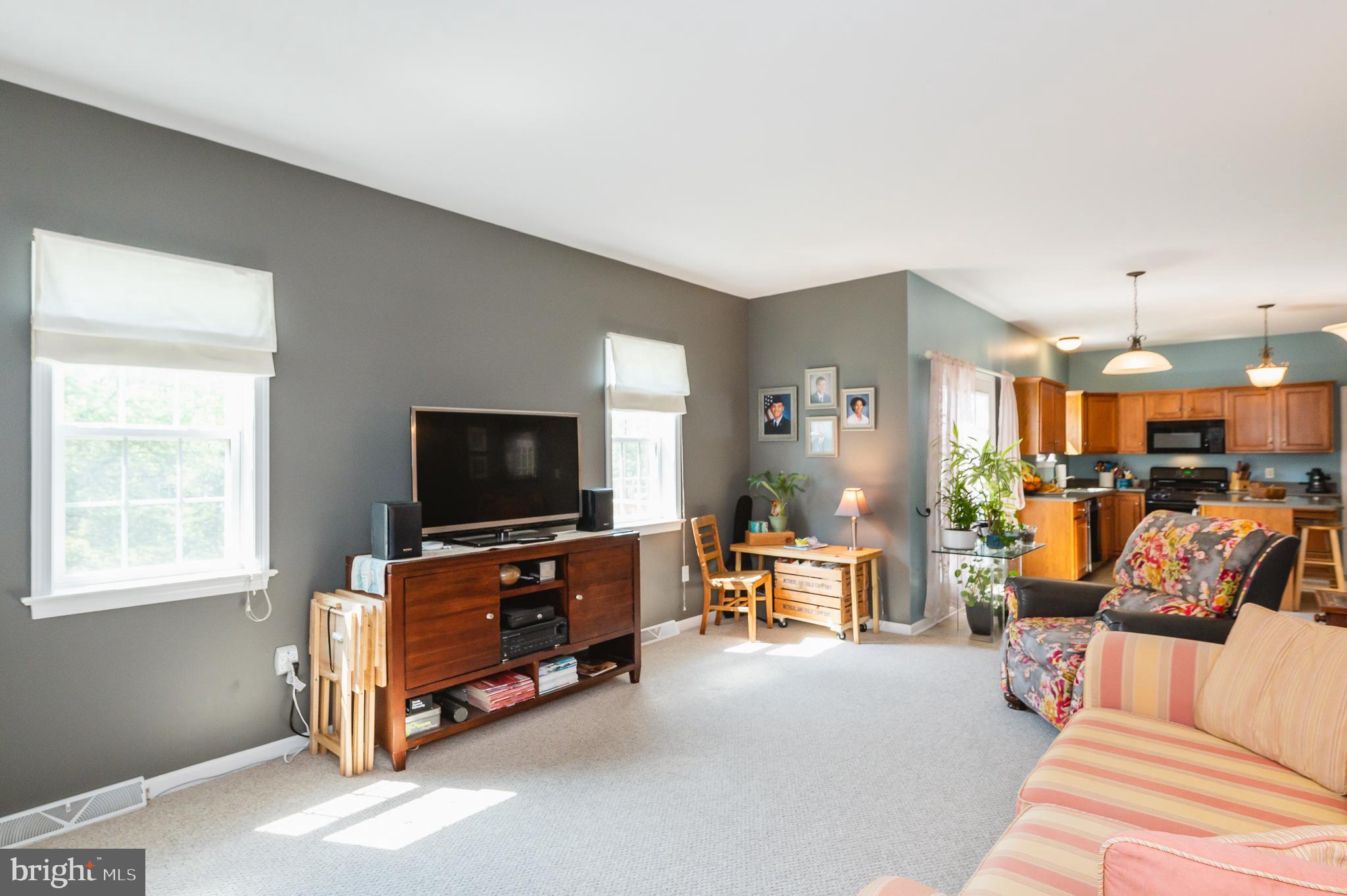 24 Eagleton Drive York, PA 17407 - Photo 26 of 70 a living room with furniture and a flat screen tv