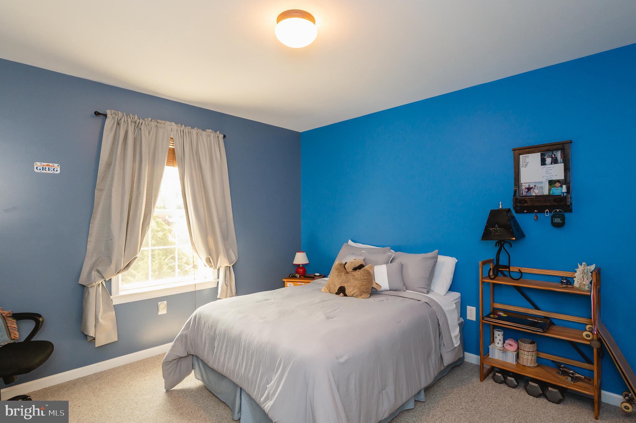 24 Eagleton Drive York, PA 17407 - Photo 35 of 70 a bedroom with a bed and a window