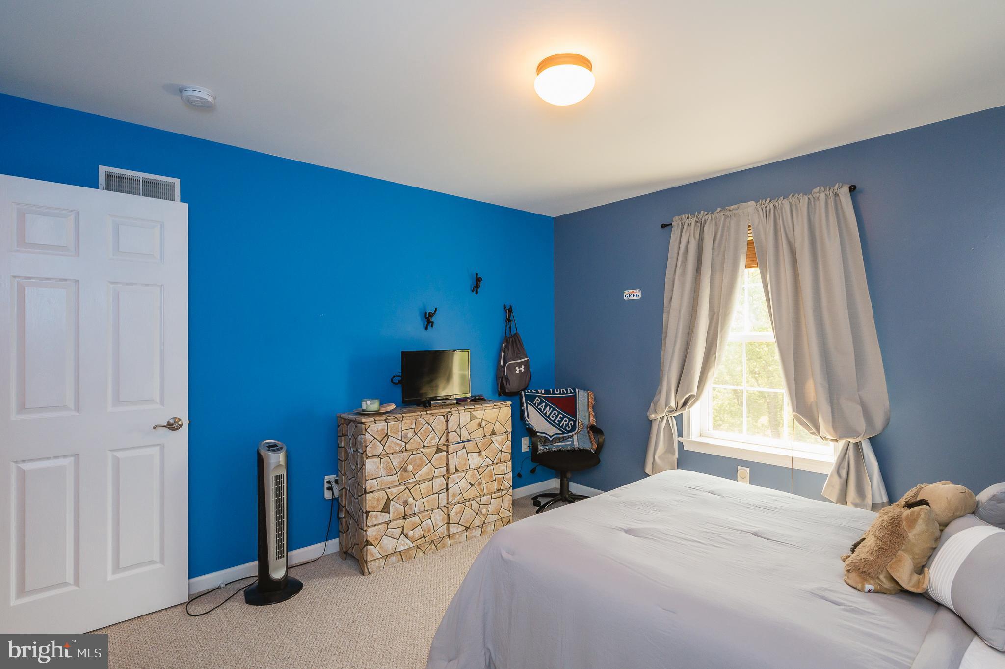 24 Eagleton Drive York, PA 17407 - Photo 36 of 70 a bedroom with a bed and a window