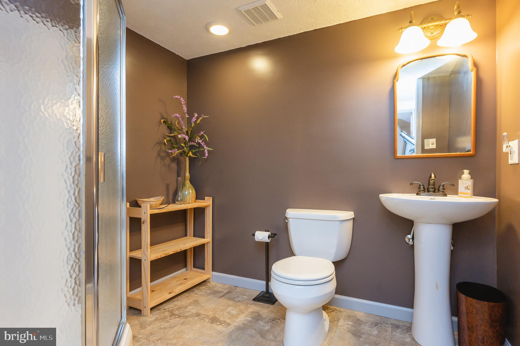 24 Eagleton Drive York, PA 17407 - Photo 52 of 70 a bathroom with a sink a toilet and shower