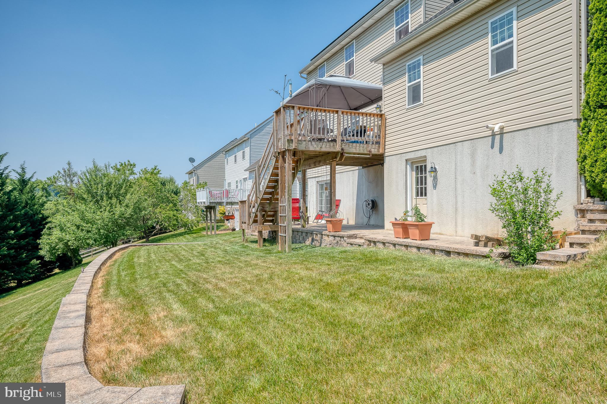 24 Eagleton Drive York, PA 17407 - Photo 63 of 70 a view of a house with a small yard and plants