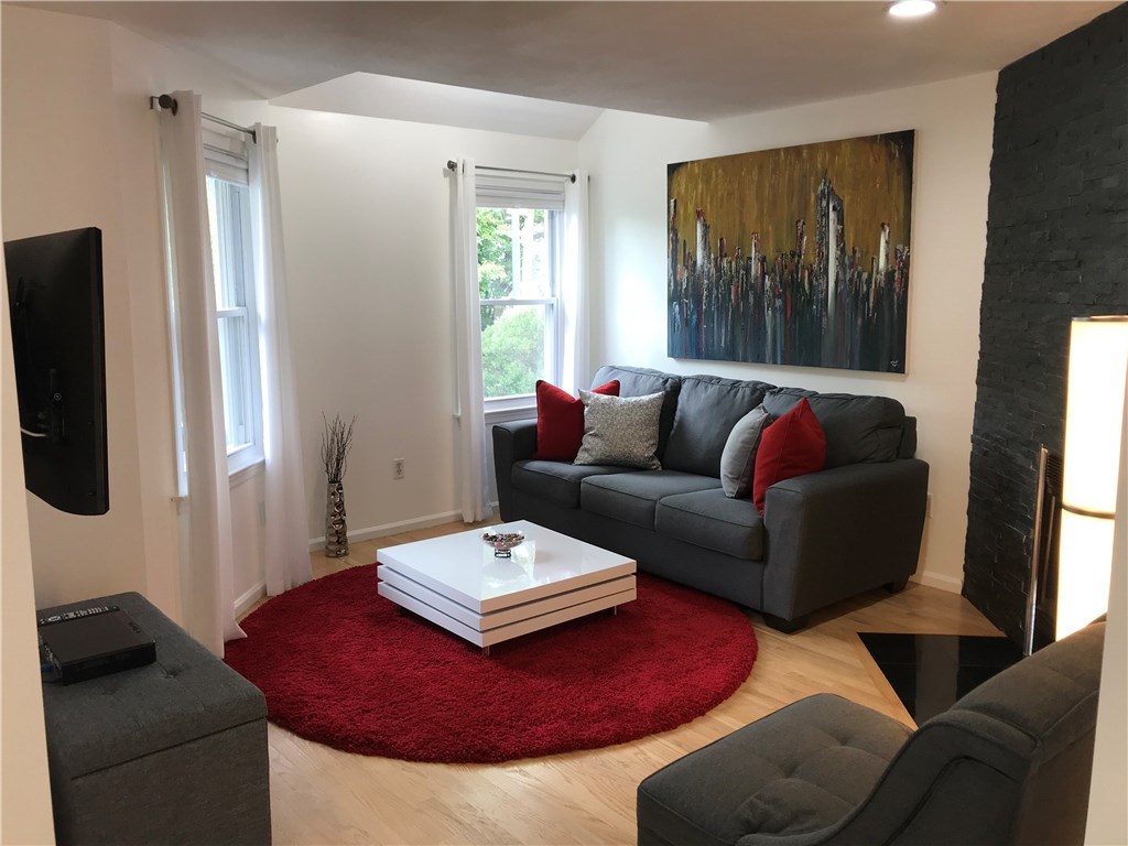 17 Spring Street, Unit B2 Pawtucket, RI 02860 - Photo 7 of 40 Modern Living Room w/Bay Windows...