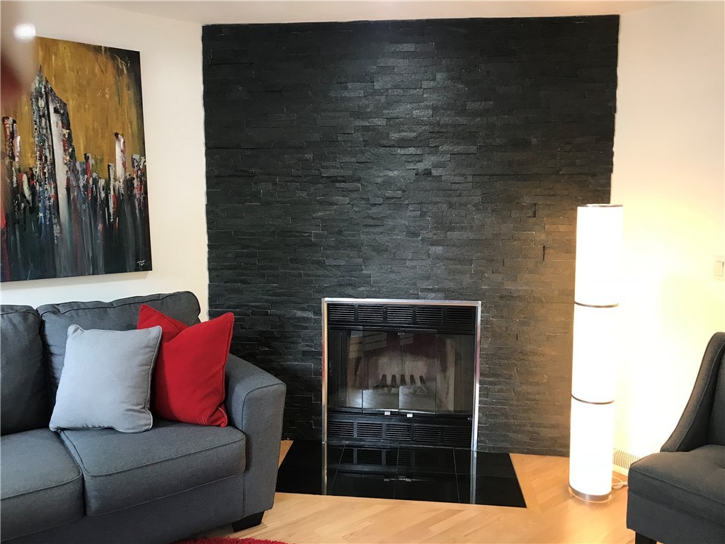 17 Spring Street, Unit B2 Pawtucket, RI 02860 - Photo 10 of 40 Gorgeously Done Stone Fireplace...