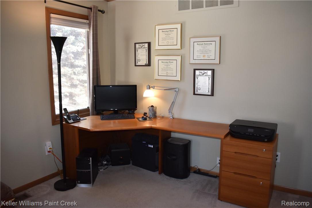 1993 Ridgefield Court Rochester, MI 48306 - Photo 10 of 47 THE LARGE LIBARY/STUDY (11 X 15) CONTAINS ENOUGH ROOM FOR A LARGE DESK!