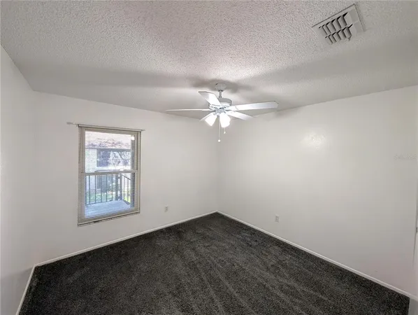 a kitchen with a sink stove and refrigerator