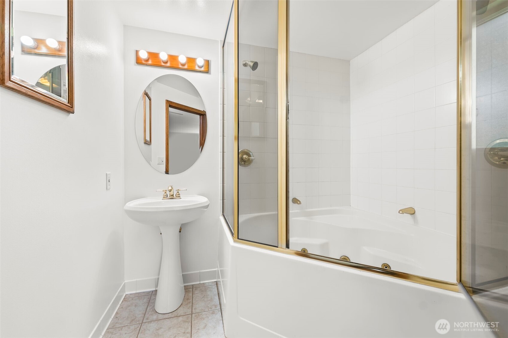 35819 Old Sultan-Startup Road Sultan, WA 98294 - Photo 19 of 40 a bathroom with a sink a mirror and shower