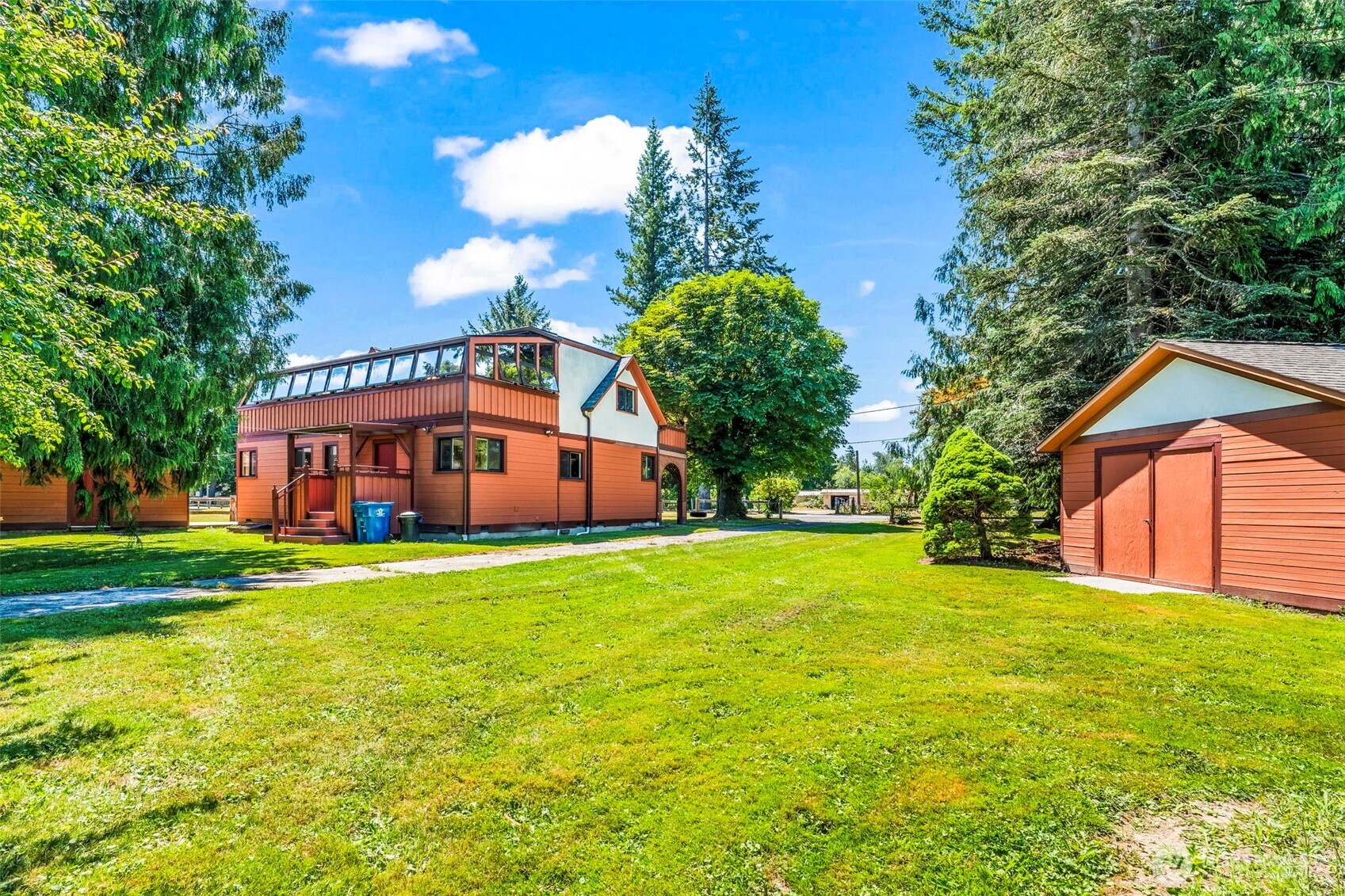 35819 Old Sultan-Startup Road Sultan, WA 98294 - Photo 2 of 40 a front view of house with yard and trees