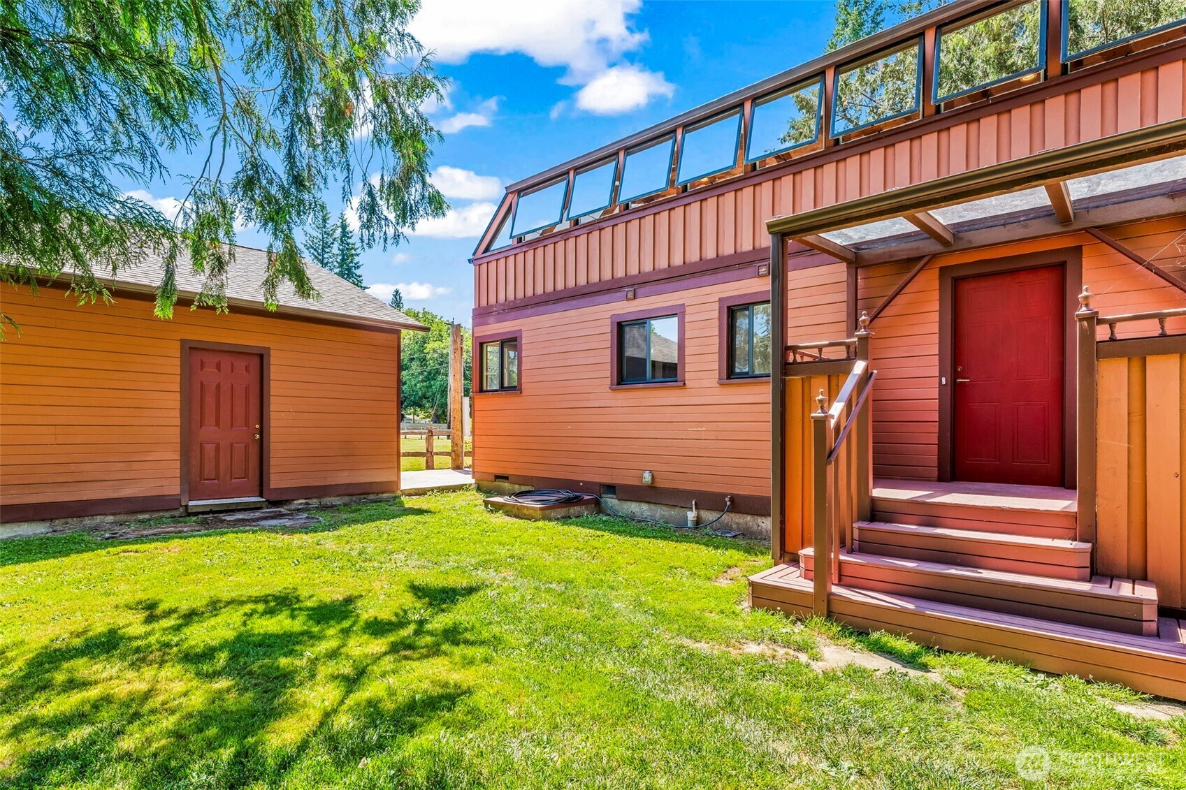 35819 Old Sultan-Startup Road Sultan, WA 98294 - Photo 21 of 40 a front view of a house with a yard