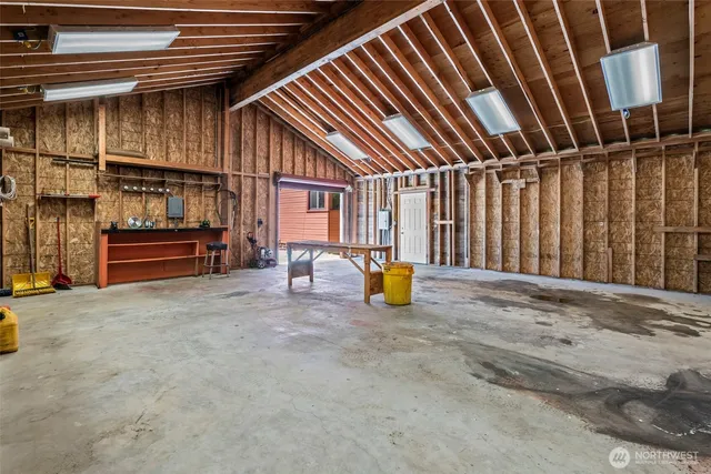 front view of a house with a tree