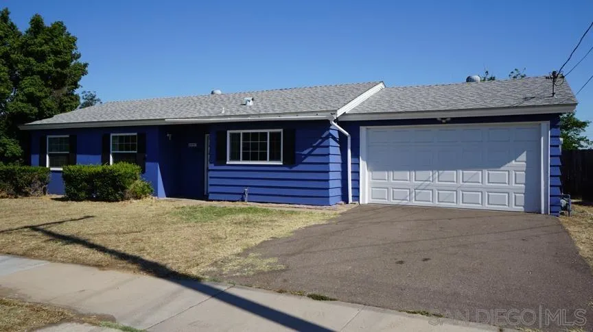 9447 Pennywood Road Santee, CA 92071 - Photo 1 of 6 a view of a house with a yard