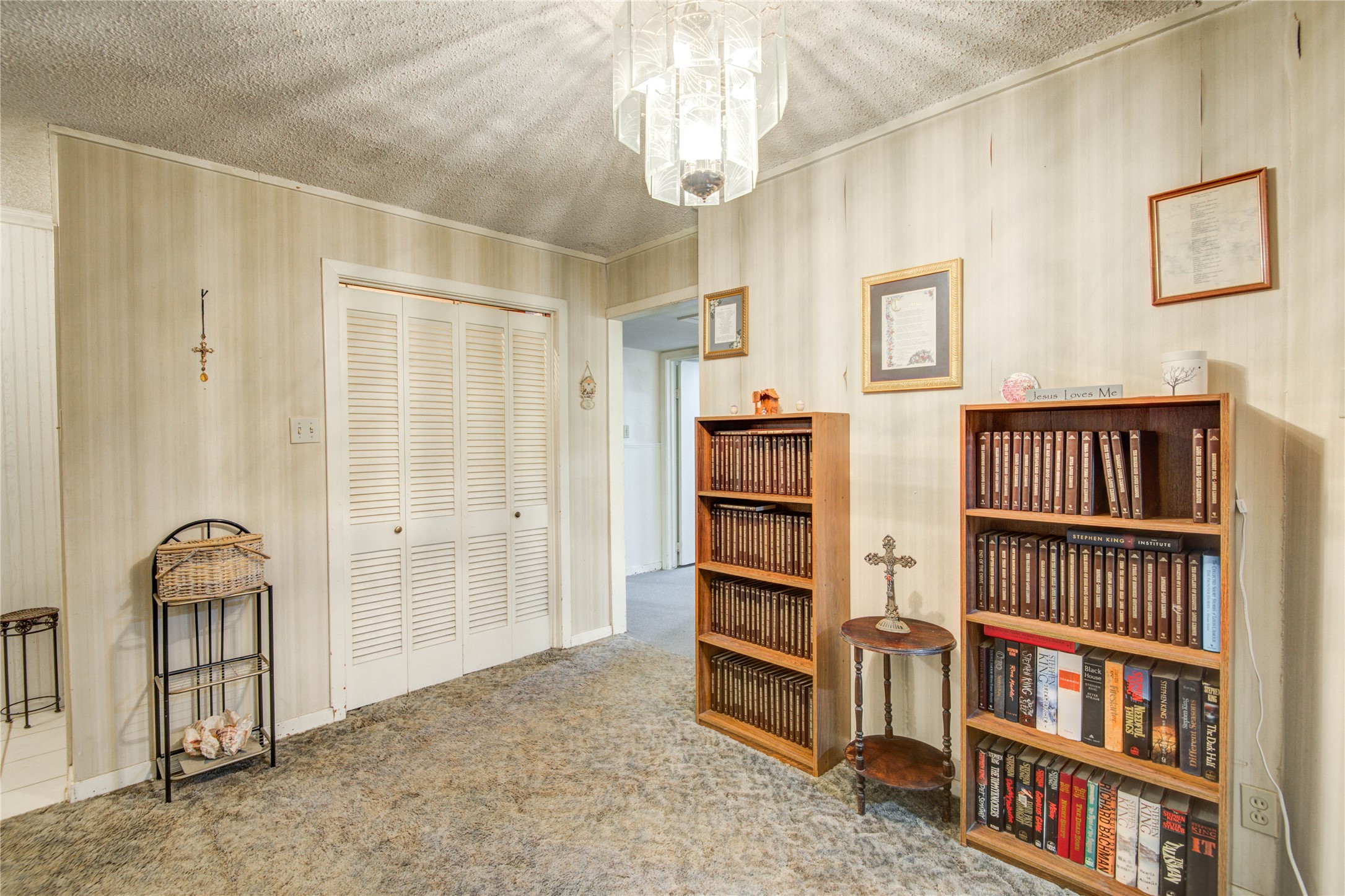 1414 West 9th Street Freeport, TX 77541 - Photo 11 of 50 a view of empty room with racks on the wall