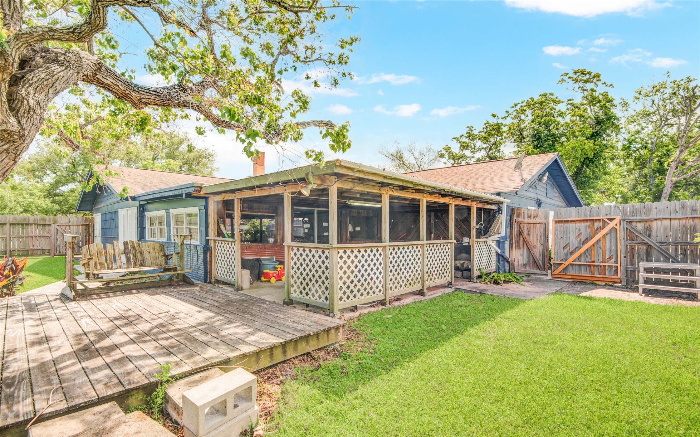 1414 West 9th Street Freeport, TX 77541 - Photo 50 of 50 a front view of a house with a yard