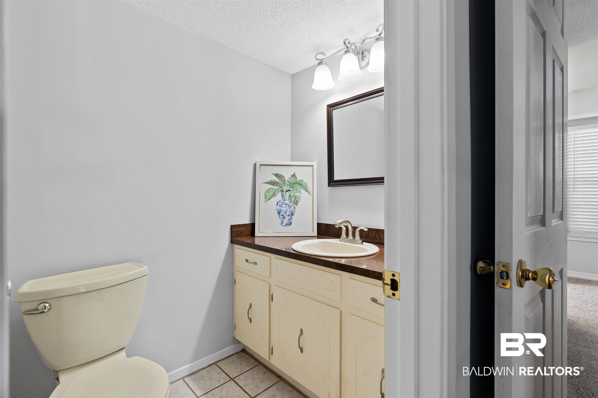 7951 Suzanne Way Mobile, AL 36695 - Photo 12 of 35 Downstairs half bath off of living room