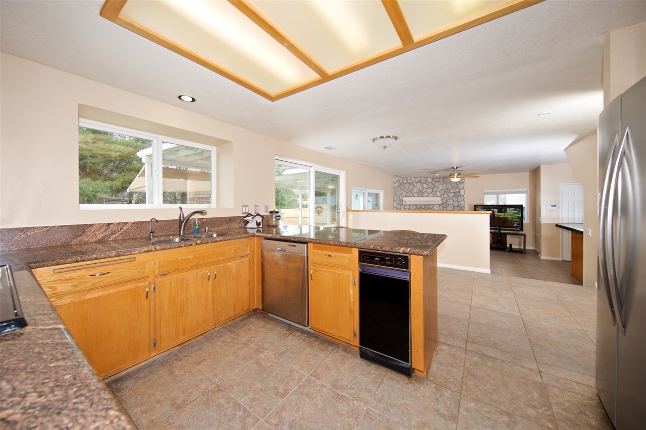 16742 Wikiup Road Ramona, CA 92065 - Photo 10 of 25 Kitchen Open to Family Room