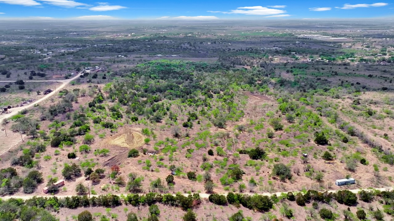 15501 Goforth Road Kyle, TX 78640 - Photo 14 of 21 a view of a city with green field