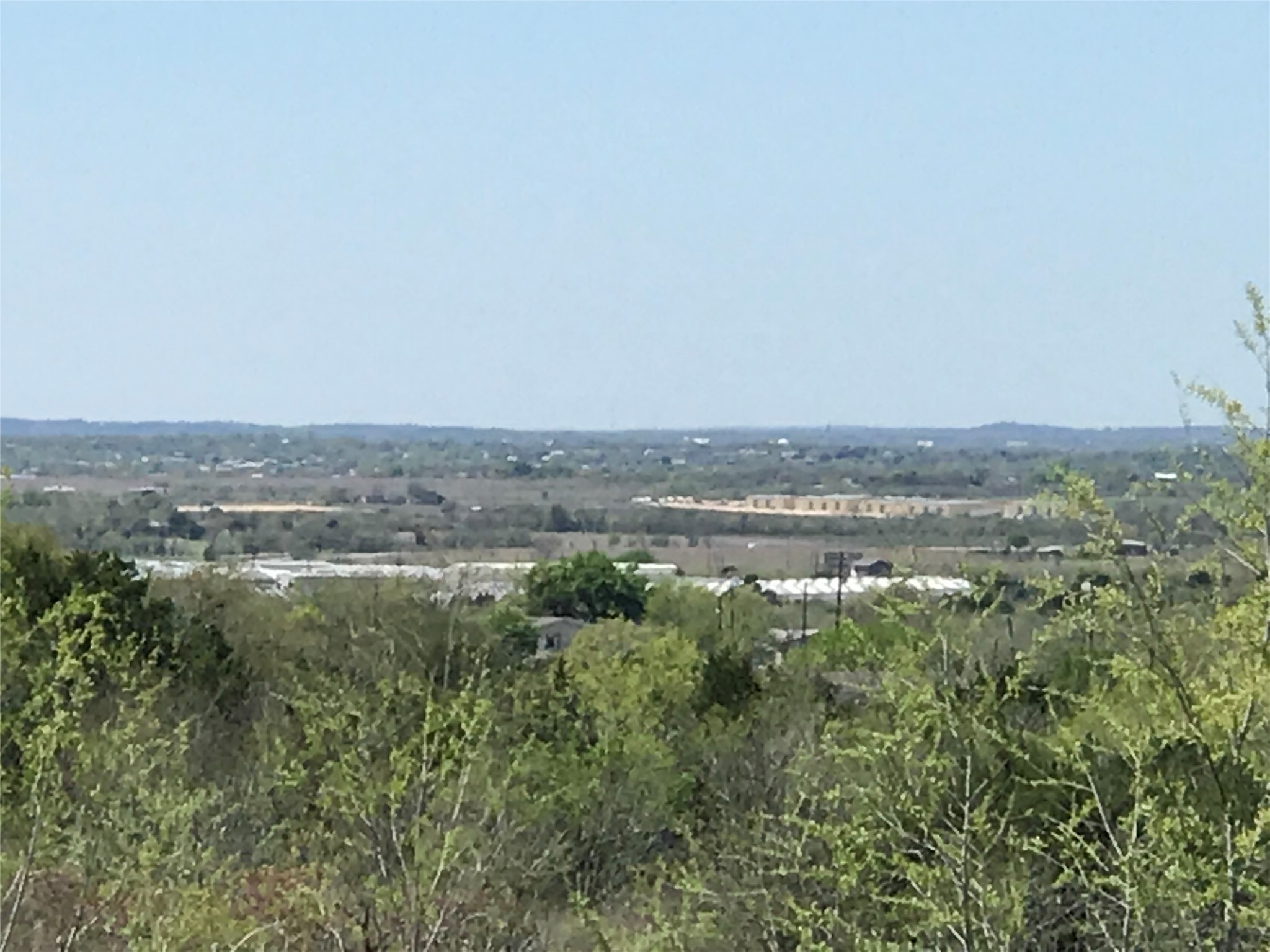 15501 Goforth Road Kyle, TX 78640 - Photo 3 of 21 an aerial view of ocean and trees