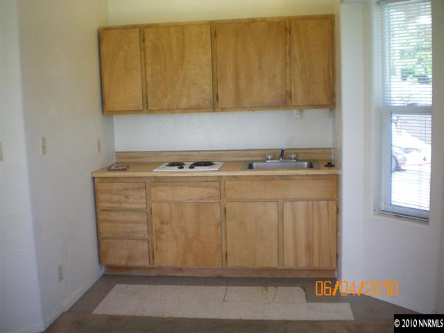 1395 North Virginia Street Reno, NV 89503 - Photo 3 of 7 a room with cabinets and a stove