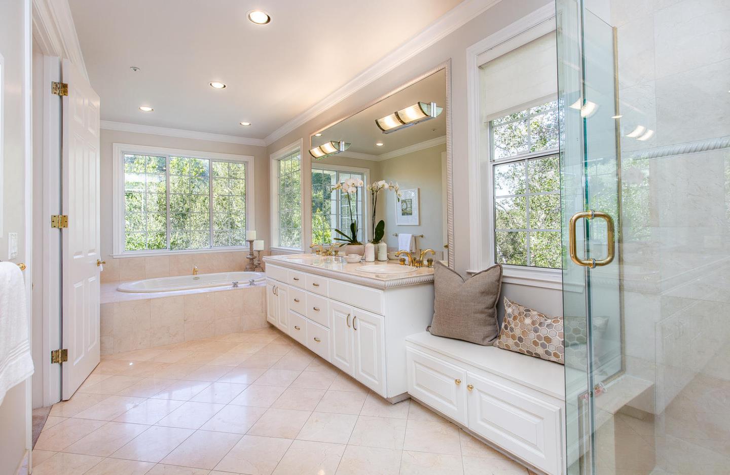 730 Chateau Drive Hillsborough, CA 94010 - Photo 23 of 48 a bathroom with a tub sink and mirror