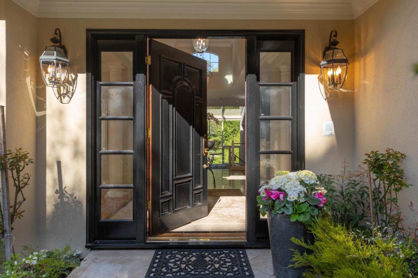 730 Chateau Drive Hillsborough, CA 94010 - Photo 3 of 48 a outdoor dining space with furniture and a potted plant