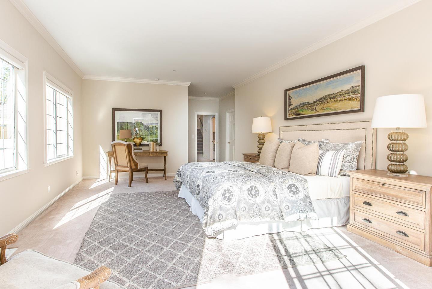 730 Chateau Drive Hillsborough, CA 94010 - Photo 31 of 48 a bedroom with a bed and a painting on the wall