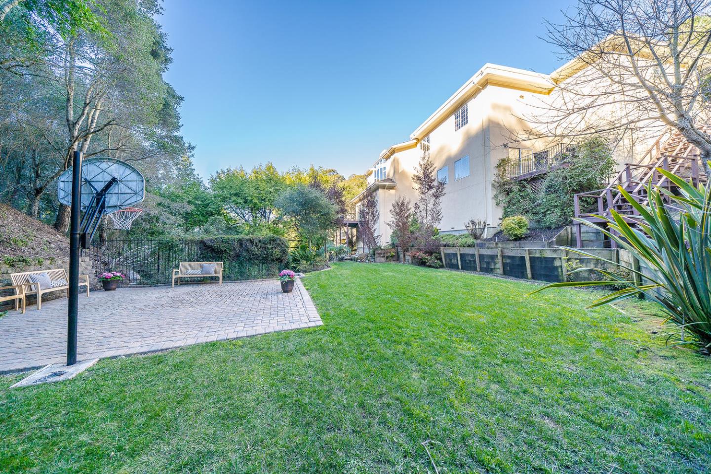 730 Chateau Drive Hillsborough, CA 94010 - Photo 40 of 48 a view of a yard with a house