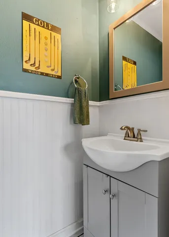 a view of a livingroom with workspace and a window