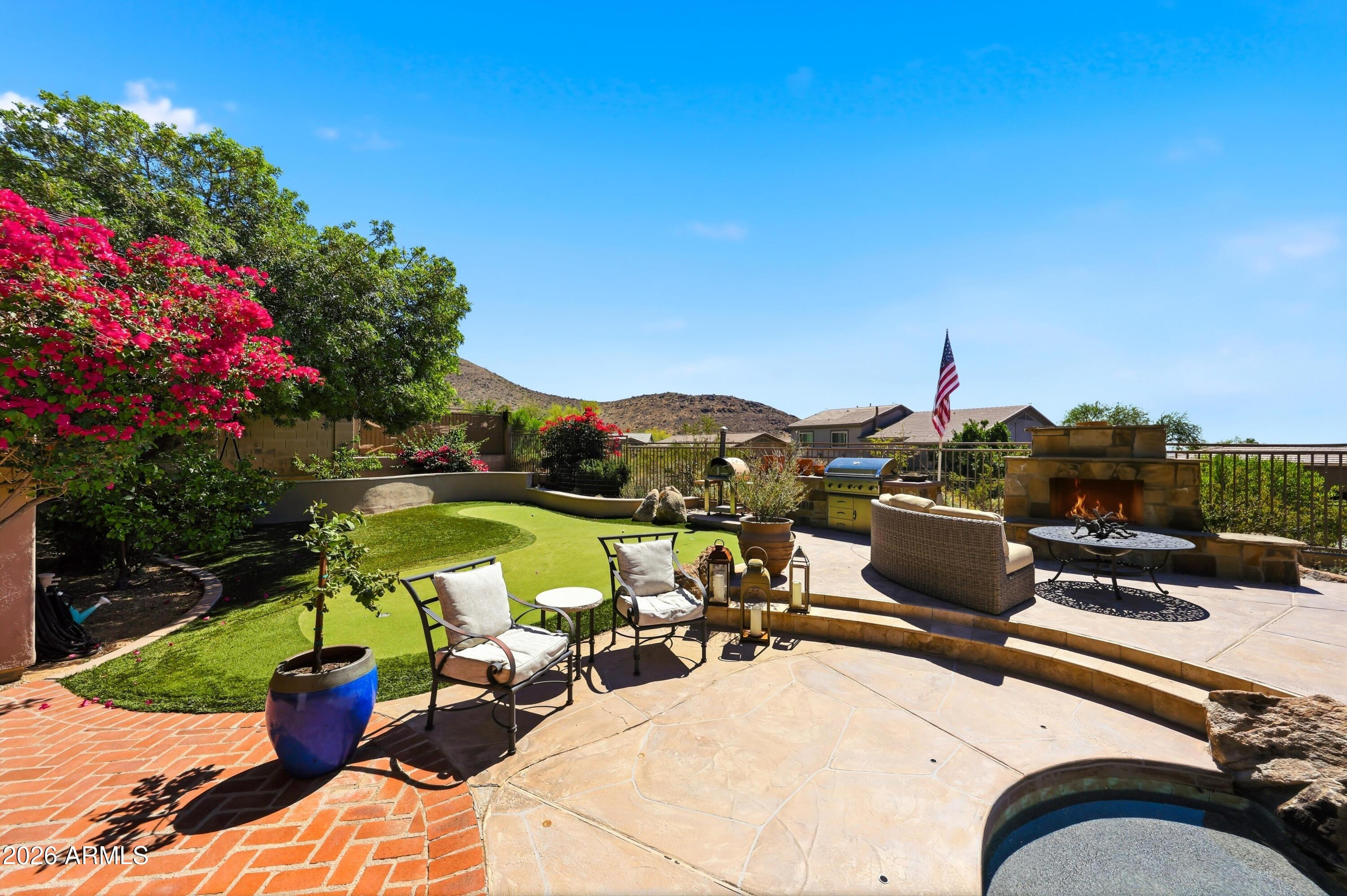 11071 East Evans Road Scottsdale, AZ 85255 - Photo 23 of 35 a view of a terrace with furniture and garden