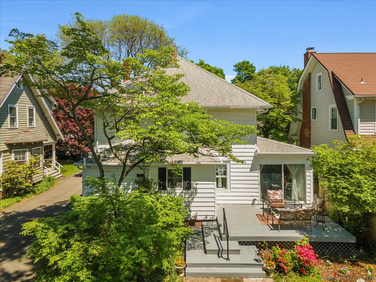 34 Filbert Street Hamden, CT 06517 - Photo 1 of 1 a front view of a house with a yard