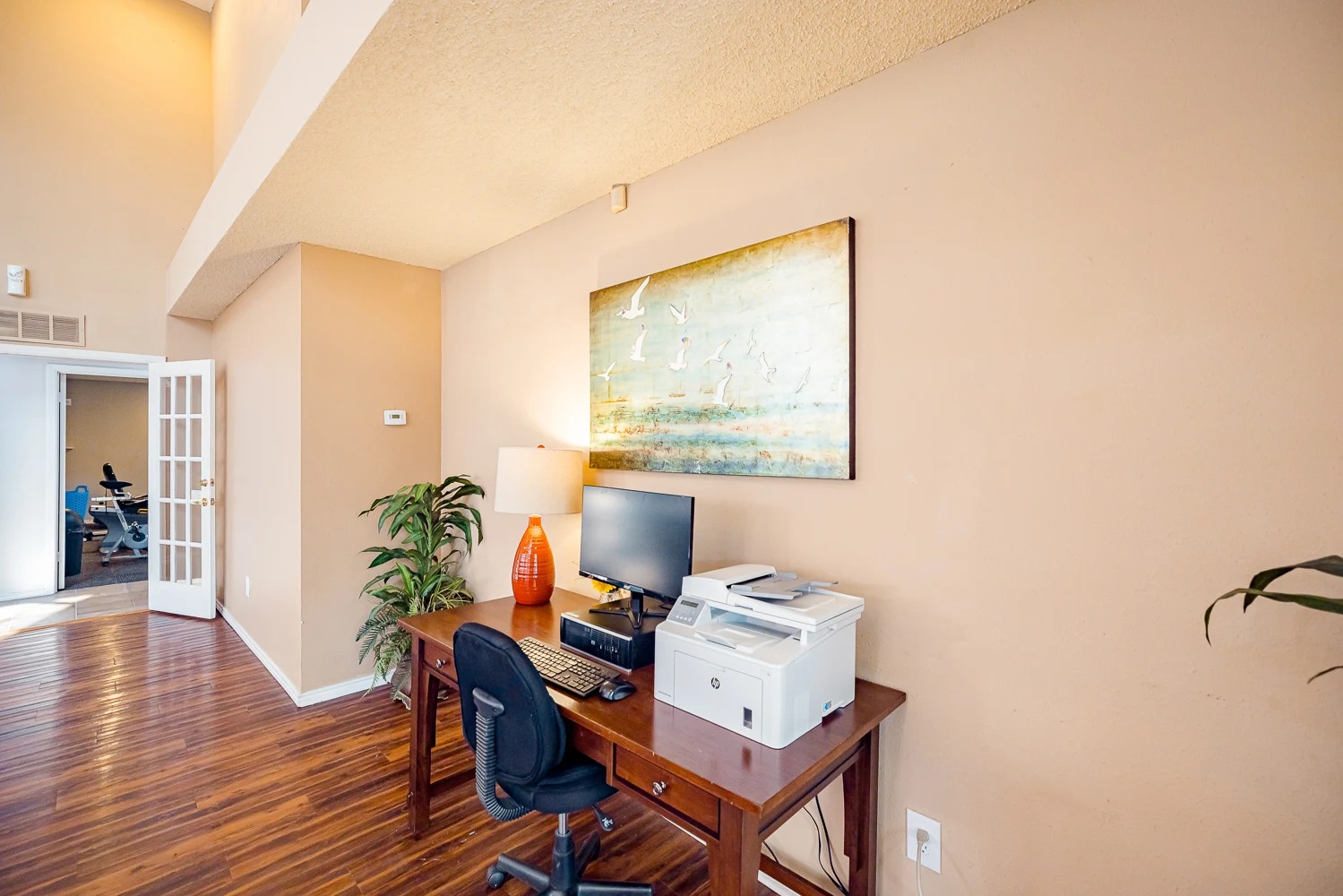 2809 West William Cannon Drive, Unit I101 Austin, TX 78745 - Photo 20 of 29 Office with french doors, a textured ceiling, and dark wood-type flooring