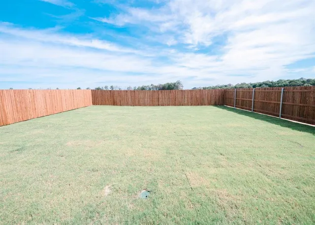 a view of an outdoor space and a yard