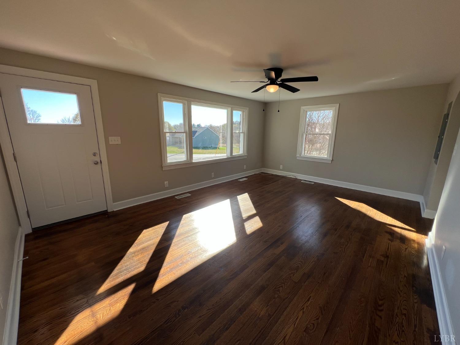 2178 Cedar Gate Road Madison Heights, VA 24572 - Photo 13 of 31 wooden floor in an empty room with a window