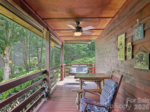 a view of a patio with a table and chairs