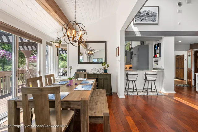 a view of a bunch of trees and cars