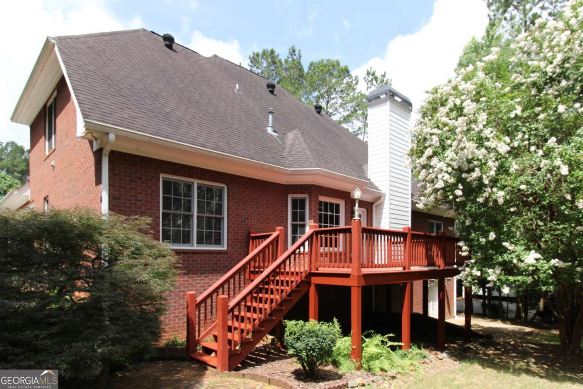 1031 Spring Lake Drive Bishop, GA 30621 - Photo 3 of 18 a front view of a house with a yard