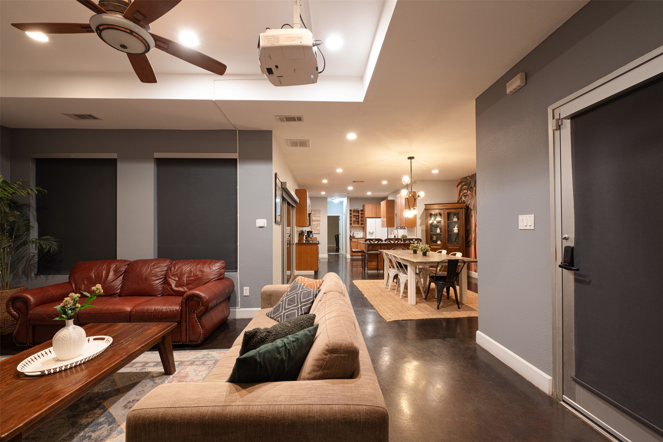 2302 East 9th Street Austin, TX 78702 - Photo 6 of 31 Integrated living spaces flow seamlessly, creating an inviting atmosphere for both relaxation and dining.