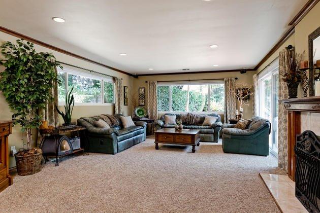 1732 South Rice Road Ojai, CA 93023 - Photo 3 of 28 a living room with furniture a large window and a fireplace