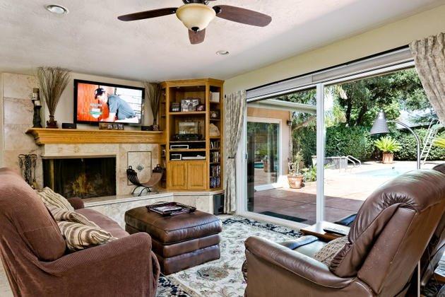 1732 South Rice Road Ojai, CA 93023 - Photo 7 of 28 a living room with furniture and a fireplace