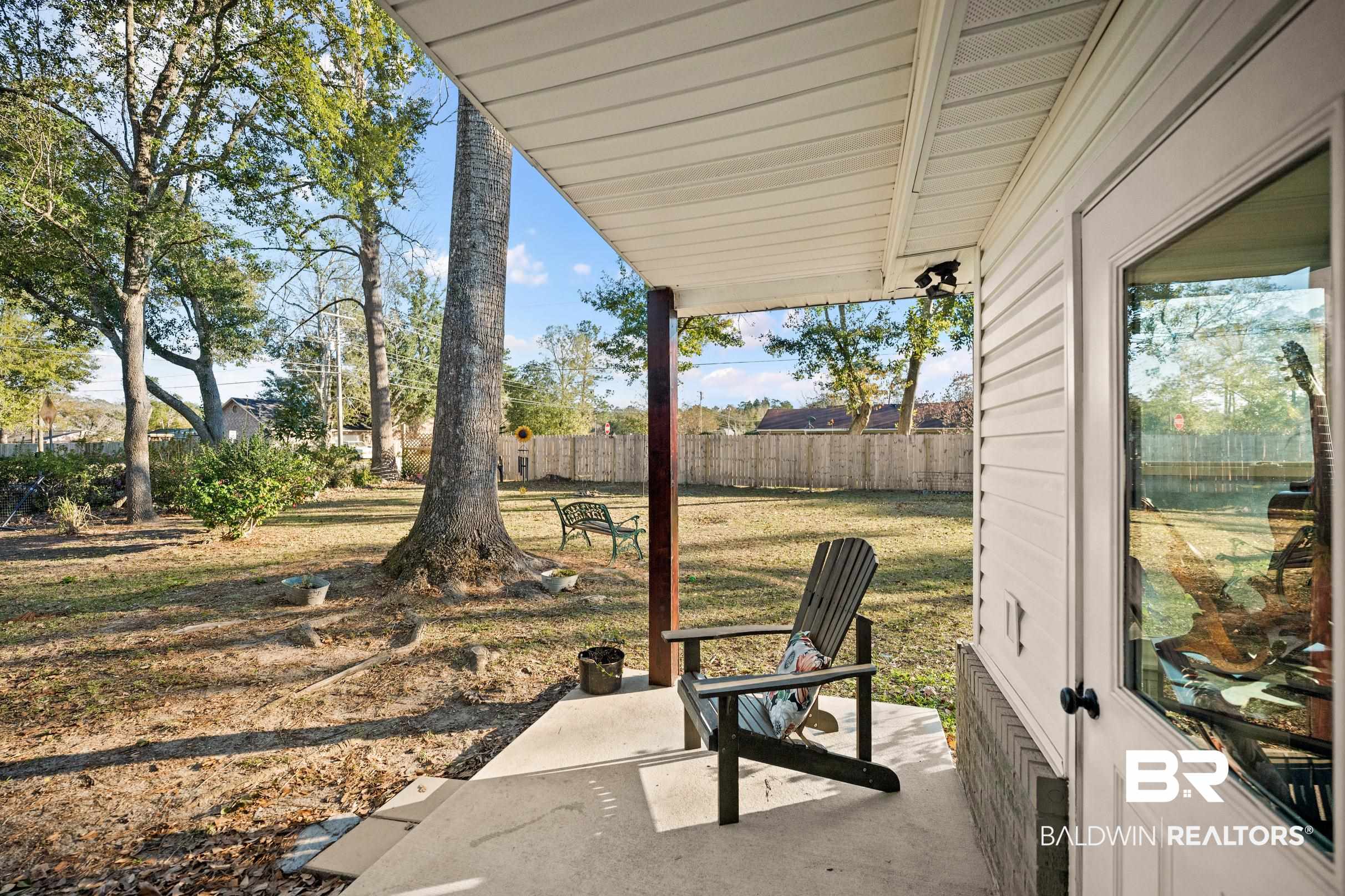 401 West Myrtle Avenue Foley, AL 36535 - Photo 35 of 39 Fenced backyard featuring a patio