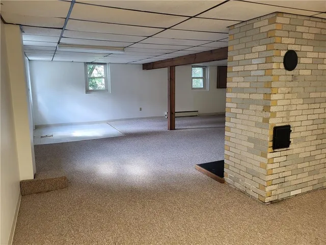 a view of a livingroom with a fireplace
