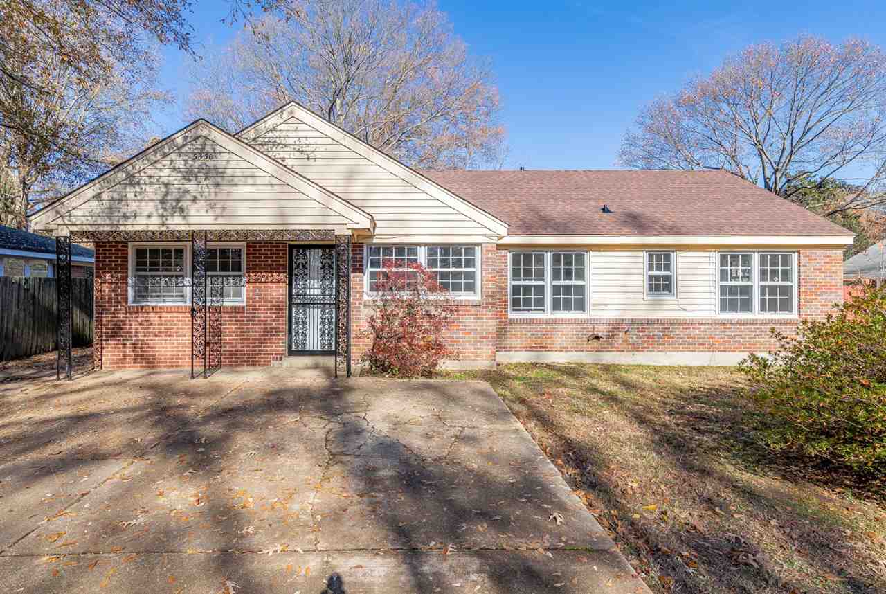 5350 Mesquite Road Memphis, TN 38120 - Photo 1 of 24 a front view of a house with a garden