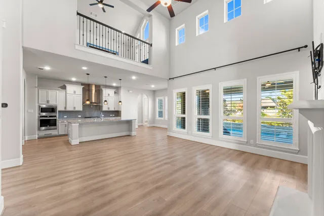 a view of an entryway with wooden floor