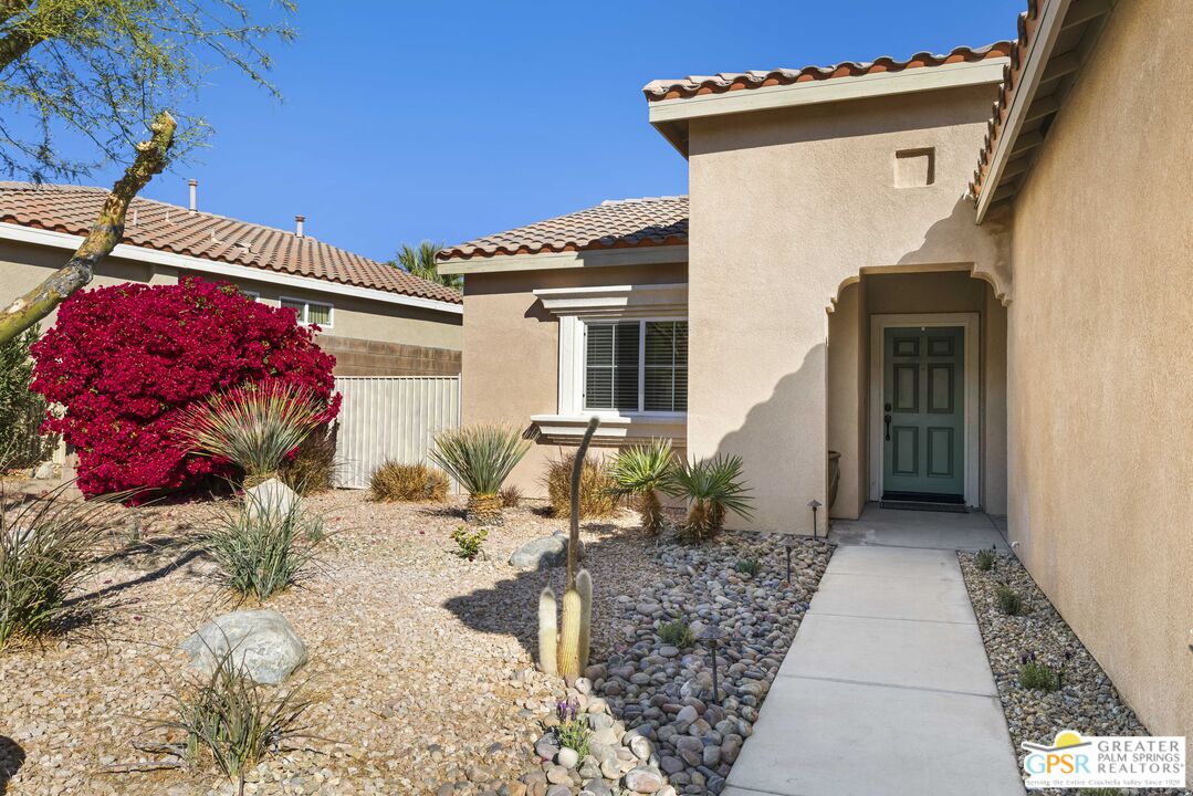 1264 Oro Ridge Palm Springs, CA 92262 - Photo 2 of 38 a view of a house with a yard