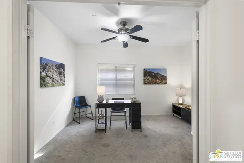 a living room with furniture and window